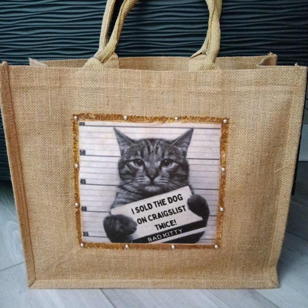 New natural jute tote embellished with a jewel trimmed sign " I Sold The Dog"